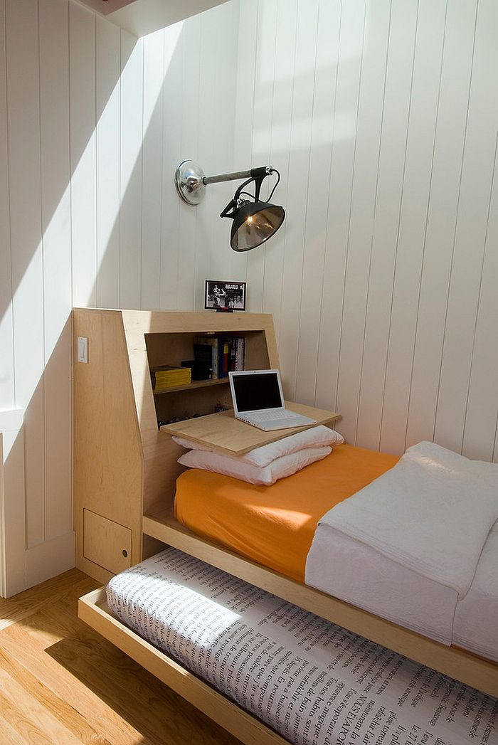 Custom designed bed with a drop-lead desk in the headboard [Design: Malcolm Davis Architecture]