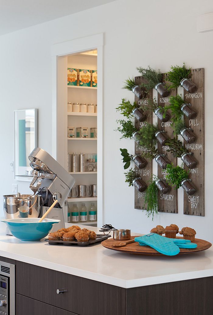 Growing Herbs And Flowers In Planters In A Kitchen Garden Flower