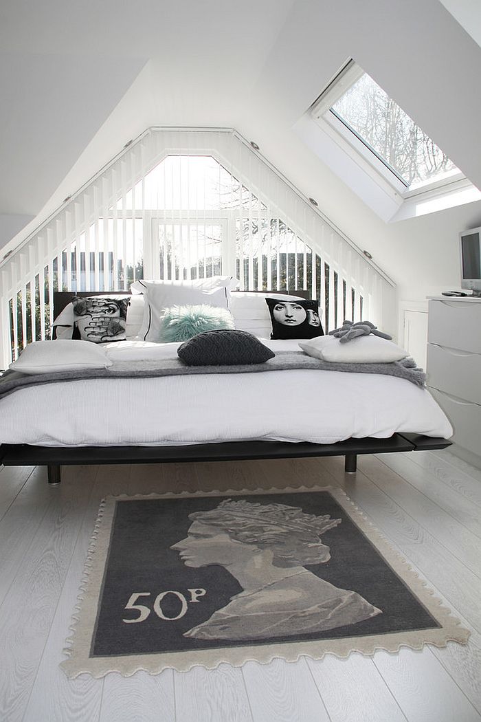 Dashing attic bedroom in black and white