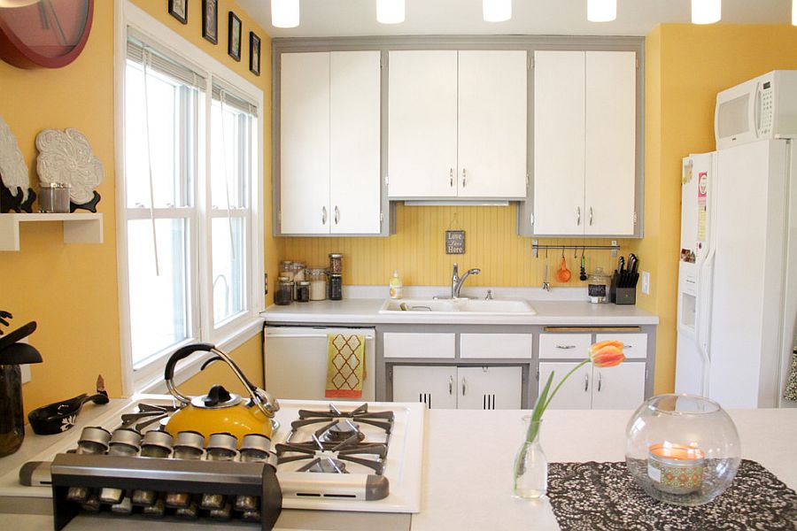 Eclectic kitchen in cheerful yellow with a hint of gray [Photography: Kaia Calhoun]