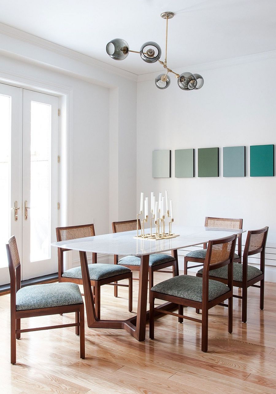 Formal dining room with chic upholstered vintage chairs