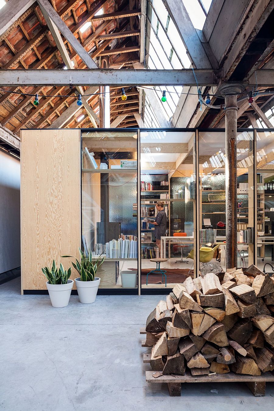 Frosted glass walls of the modern office inside old textile factory