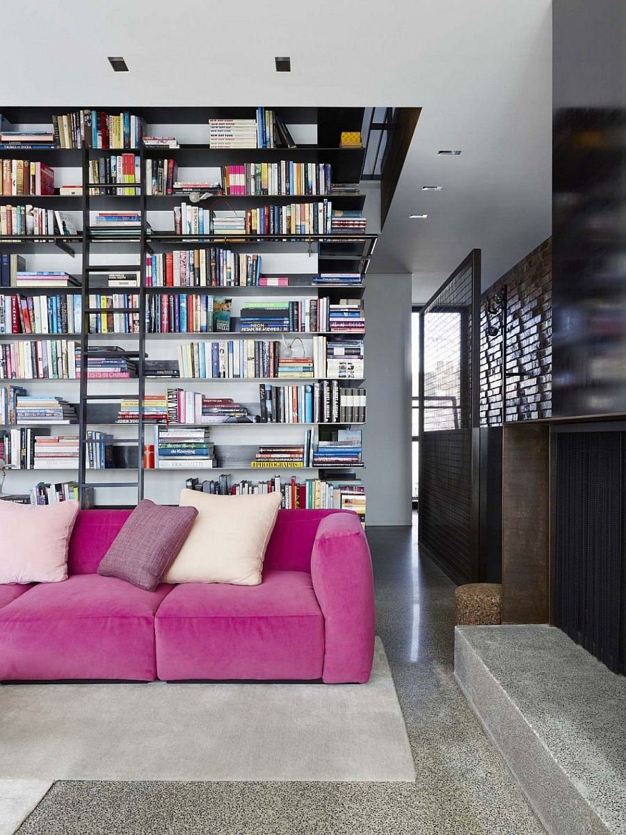 Giant wall of books steals the show in this exquisite Melbourne living room