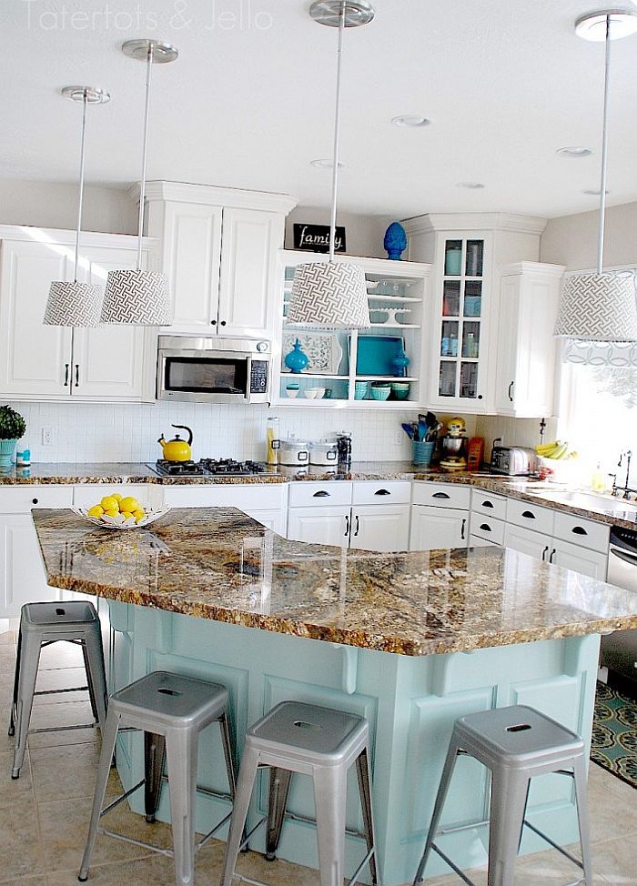 Gorgeous kitchen in aqua and white with open cabinetry