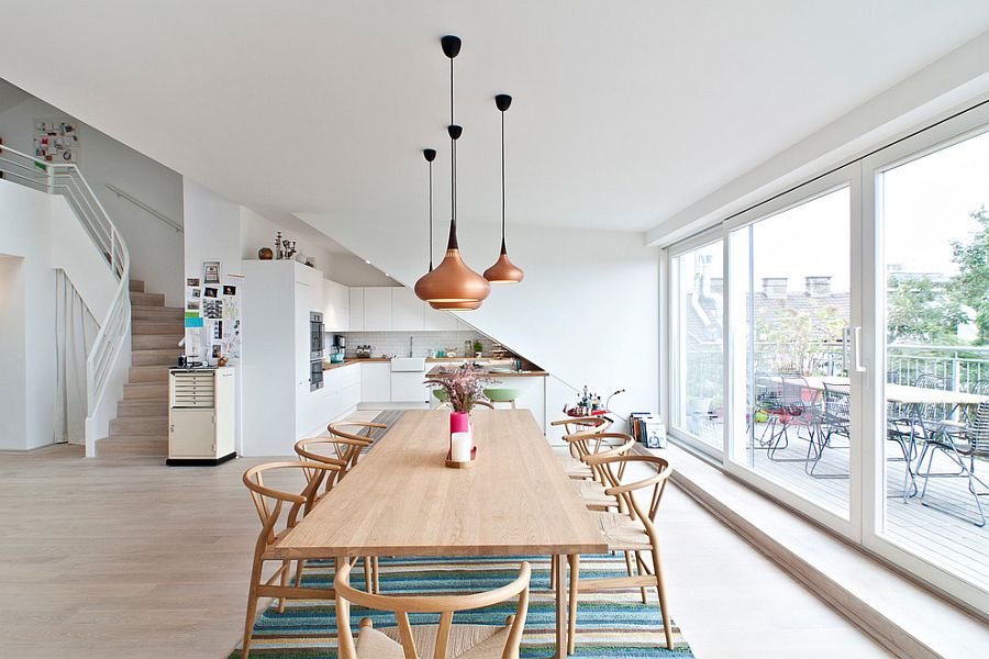 Gorgeous pendants bring metallic glint to the posh interior [Design: Nina Hausott]