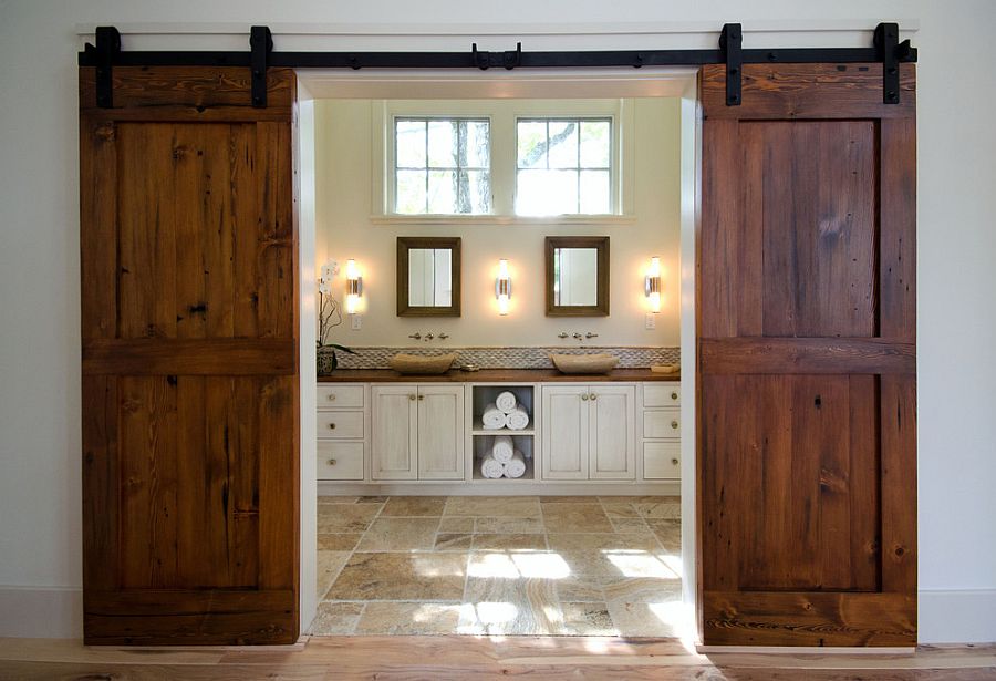 Gorgeous reclaimed Fir barn doors for the posh master bathroom [Design: Bonin Architects & Associates]