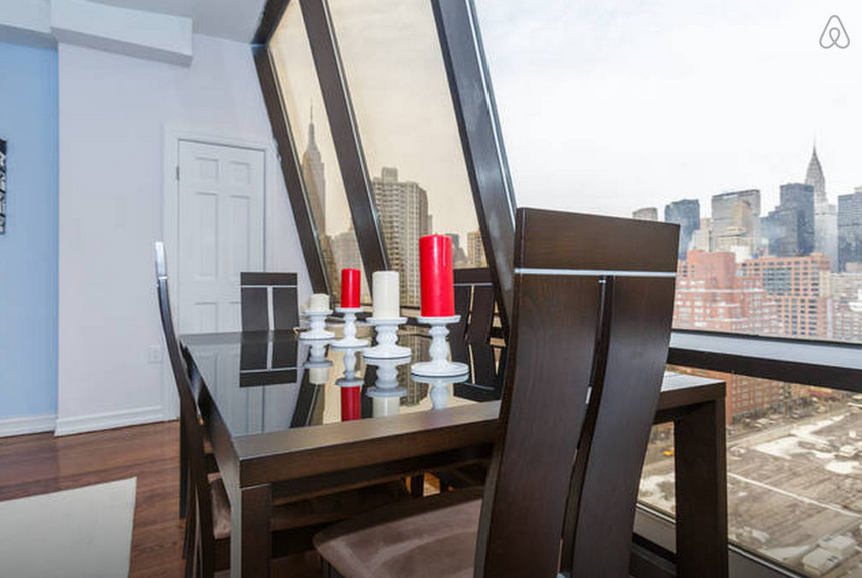 Kips Bay Penthouse Dining Area with Skyline View