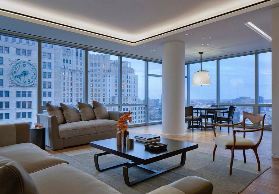 Large glass windows of the apartment offer expansive views of the NYC SKyline