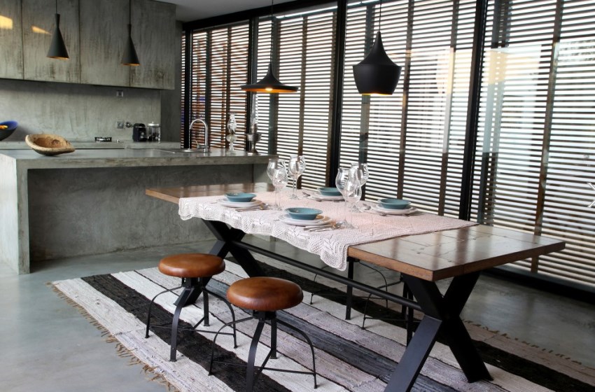 Leather and metal stools in a modern dining room