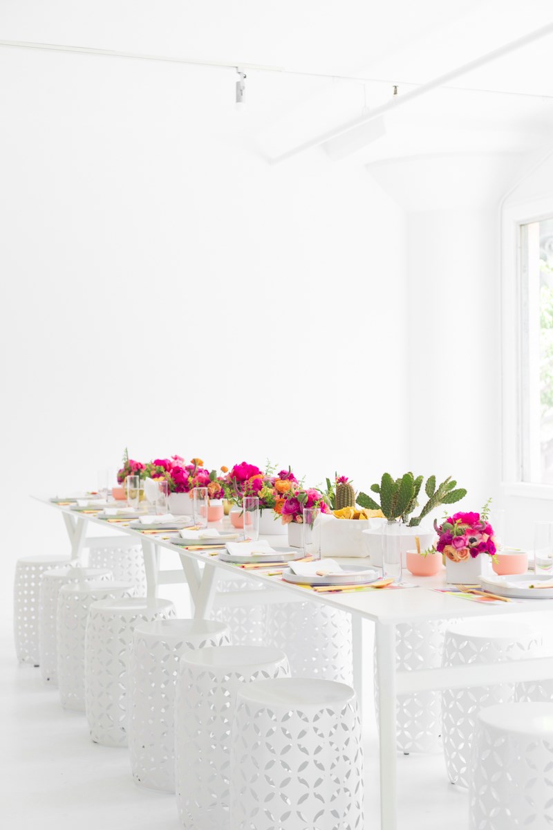 Long party table with white stools