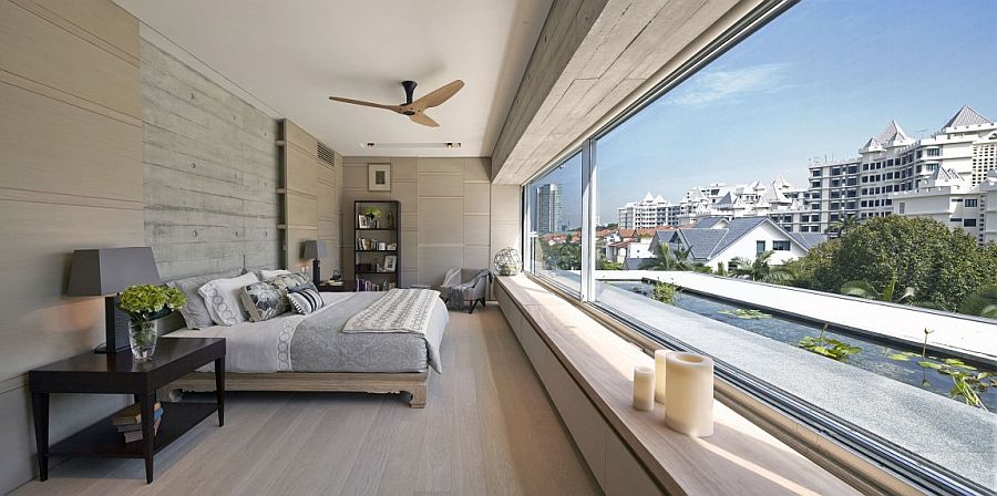 Master bedroom on the top floor with dramatic views of the city skyline