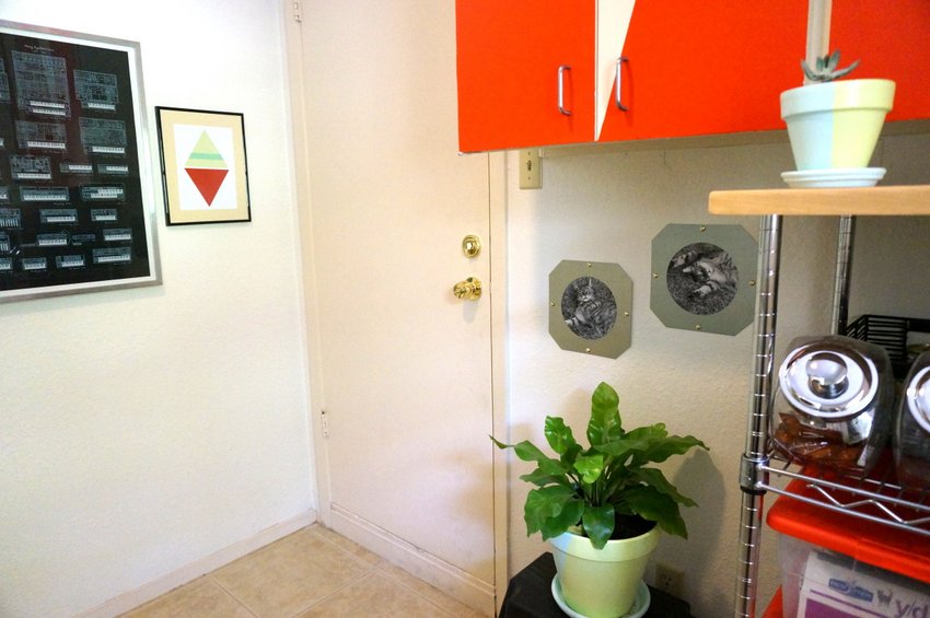 Modern laundry room with DIY photo frames