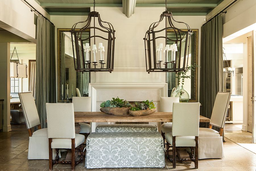 Oversized lighting fixtures in the dining room [Design: McAlpine Tankersley Architecture]