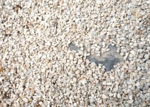 Redistribute-gravel-to-cover-bare-spots-217x155