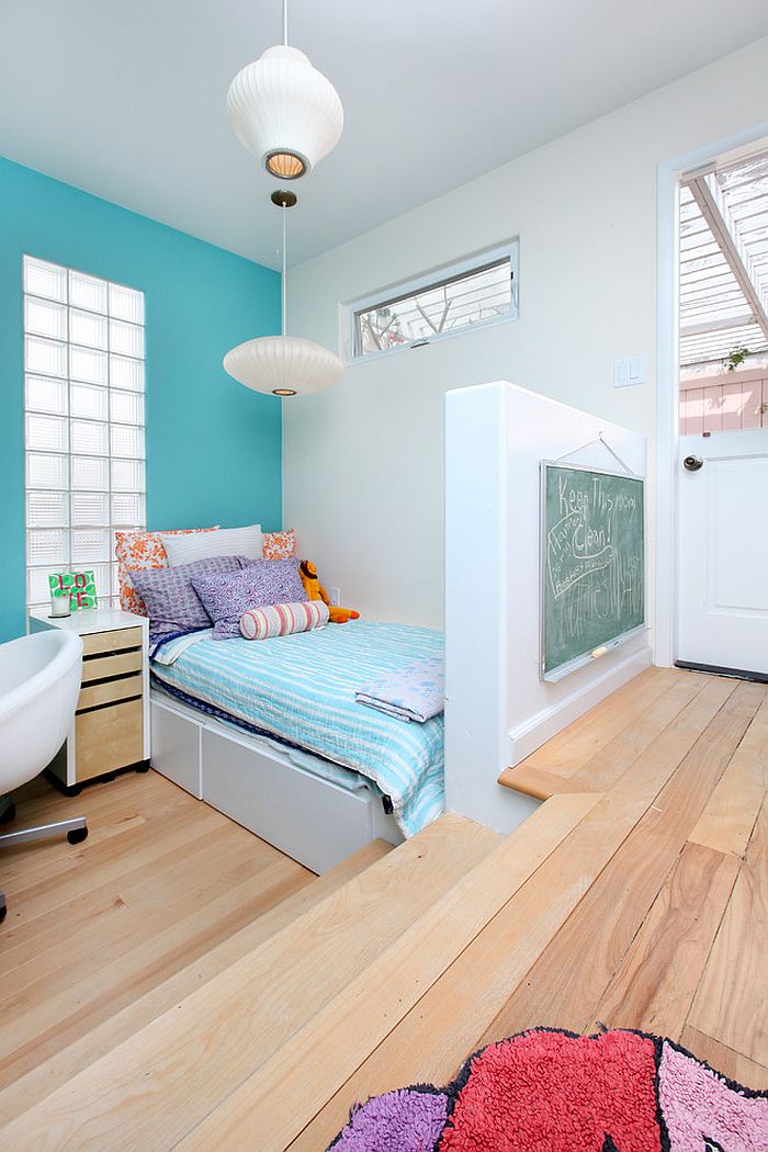 Sculptural lighting and color scheme add to the elegance of the small kids' bedroom [Design: V.I.Photography & Design]