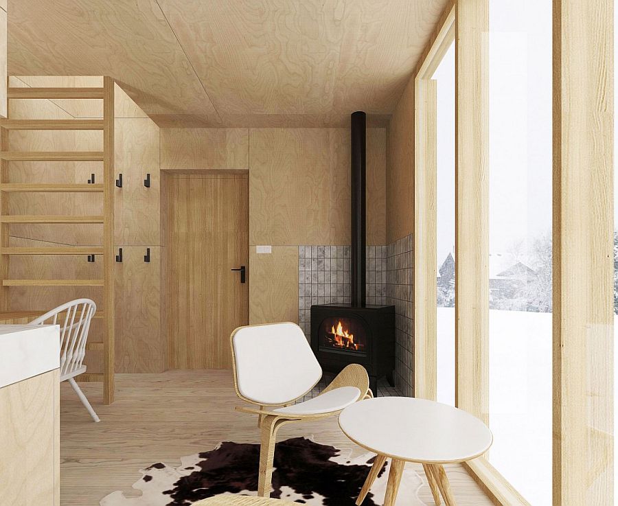 Simple wooden surfaces and decor shape the interior of the minimal winter retreat