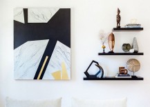 Sleek-floating-shelves-and-captivating-wallart-in-the-living-space-217x155