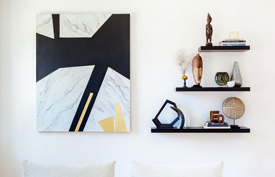 Sleek floating shelves and captivating wallart in the living space