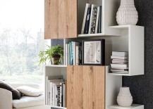 Sliding-doors-of-the-bookshelf-give-it-a-dynamic-appeal-217x155