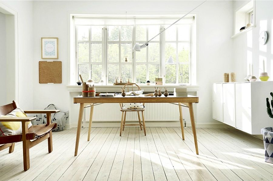 Slim, minimal wooden desk steals the show in this Scandinavian room