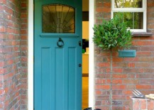 Small-front-entrance-with-a-tall-topiary-217x155
