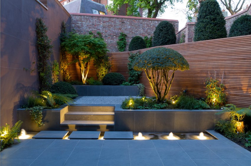 Small outdoor space with an illuminated water feature