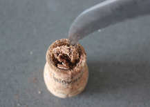 Start-hollowing-out-wine-cork-with-knife-217x155