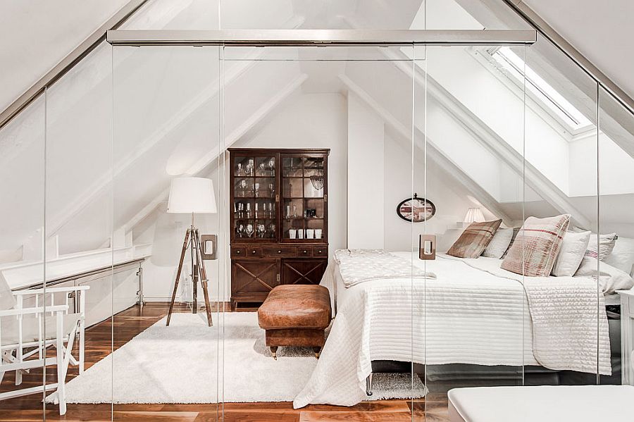 Stunning attic bedroom with glass walls