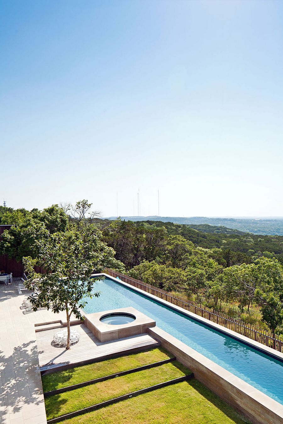 Stunning backyard and pool overlooking Bright Leaf preserve