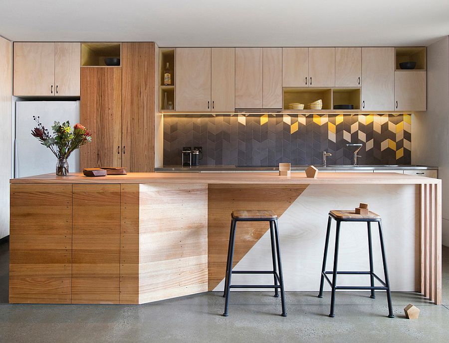 Subtle use of bright lemon accents in the contemporary kitchen