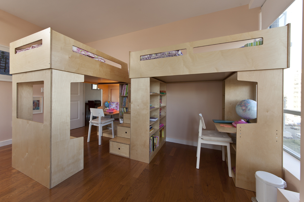 Two Dumbo loft beds share storage stairs