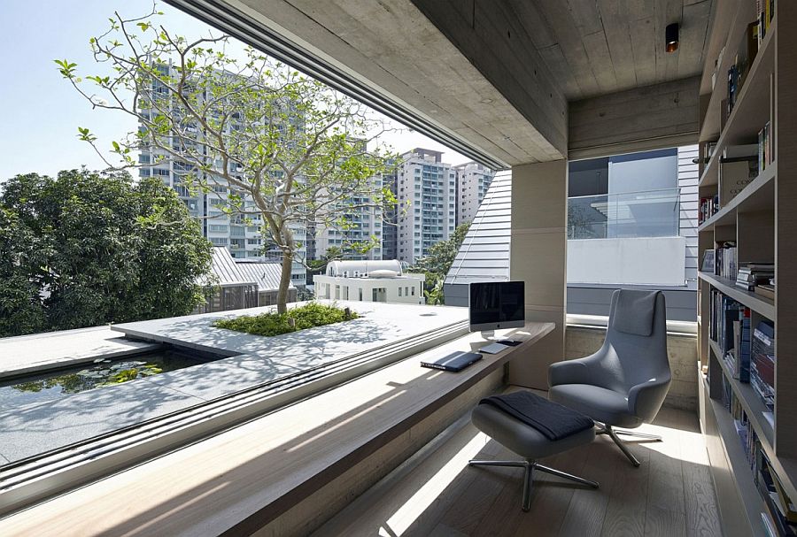 View of the top level lily pond and rooftop garden from the home office