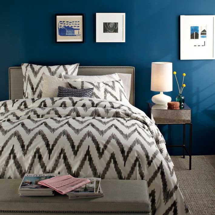 West Elm Organic Cotton Sheets in Ikat against Blue Backdrop