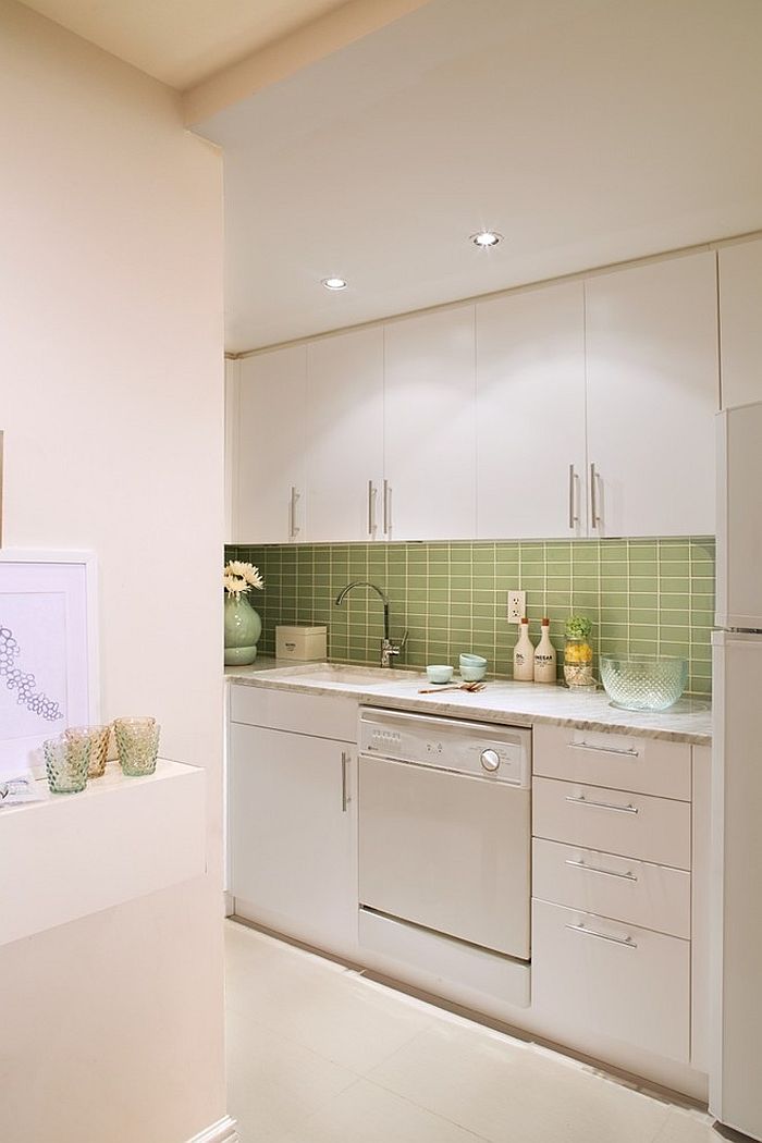 White Scandinavian kitchen with a gorgeous green tiled backsplash