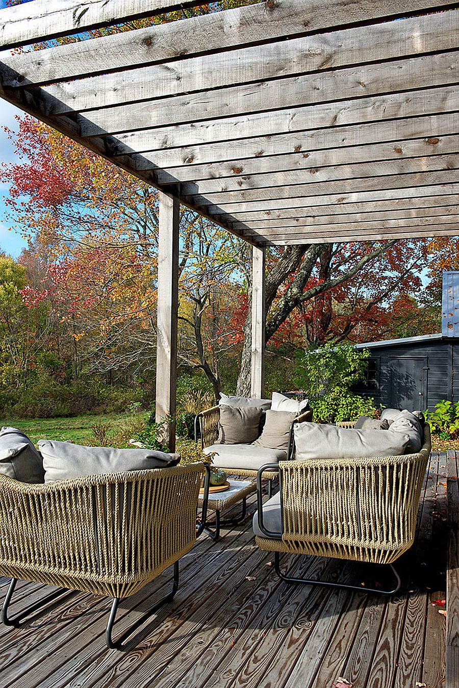 Wooden beams offer shade and give the deck space a sense of uniqueness