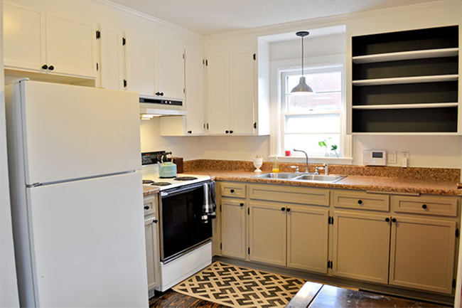 Yellow wood kitchen made over with white paint black interiors