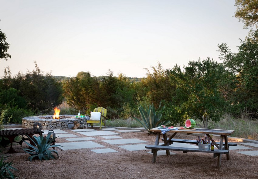 Backyard with a graveled dining area