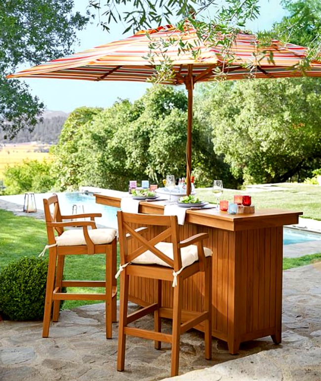 Outdoor home bar with an umbrella