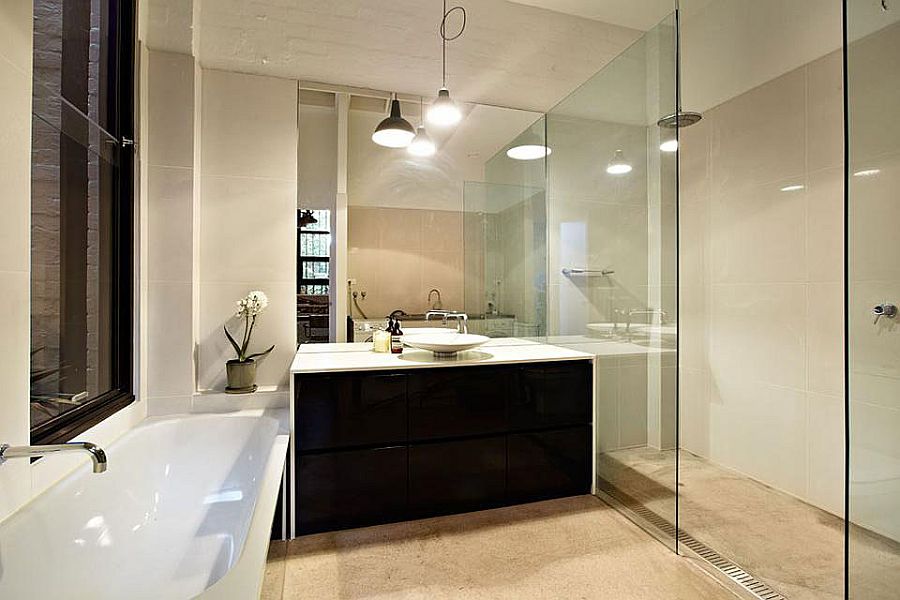 Black and white bathroom vanity and lovely lighting shape the beautiful bathroom