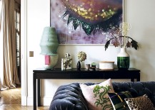Bold-wall-art-and-curated-collection-of-accessories-set-the-mood-inside-this-Paris-home-217x155