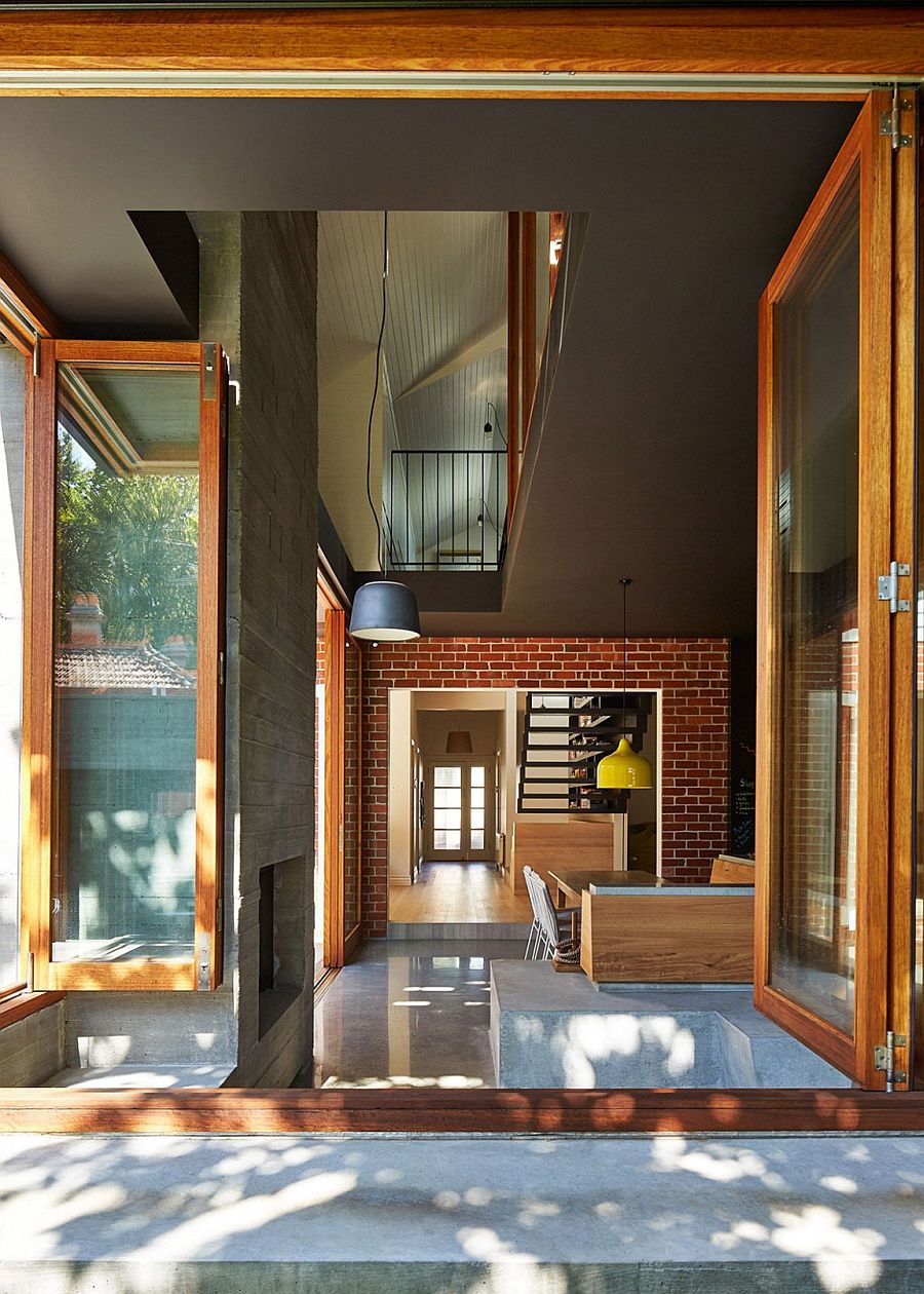 Brick wall adds a unique visual to the dining space