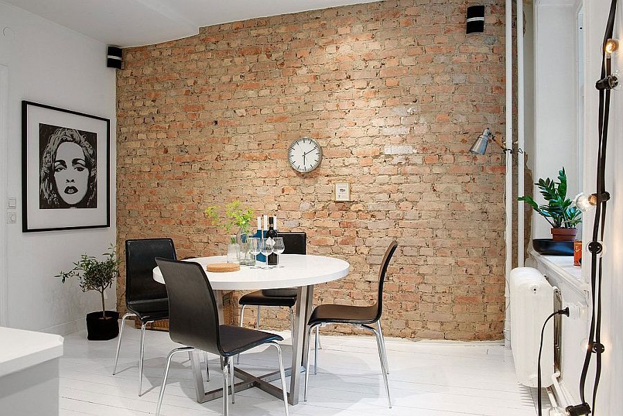 Brick wall presents a unique backdrop for the kitchen