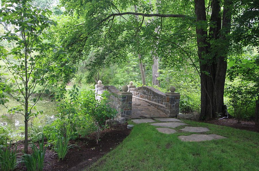 Classic stone garden bridge for those who wish to go beyond wood [Design: Conte & Conte]