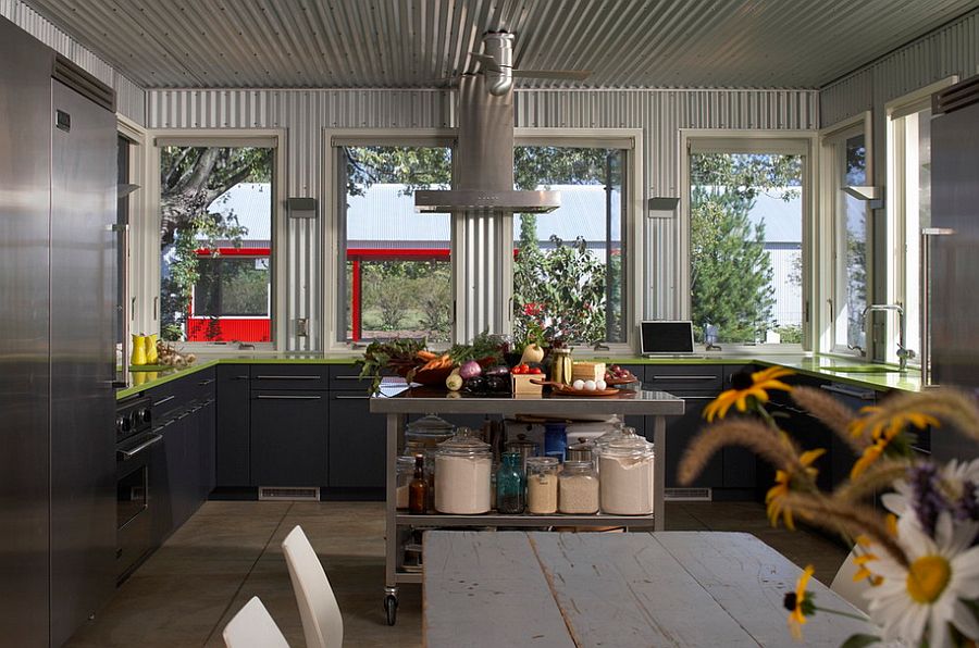 Corrugated metal adds a unique dimension to this kitchen and family space [Design: Wheeler Kearns Architects]