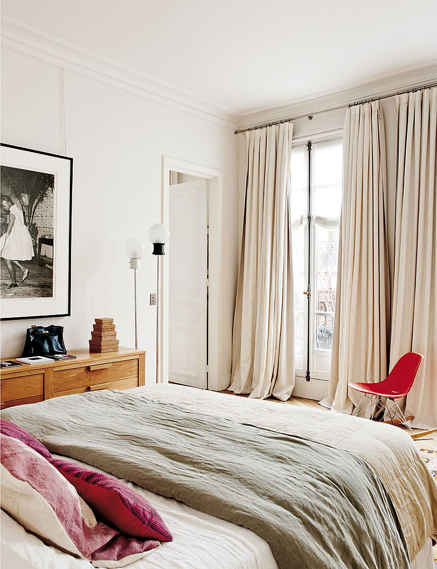 Cozy bedroom in white with a touch of pink