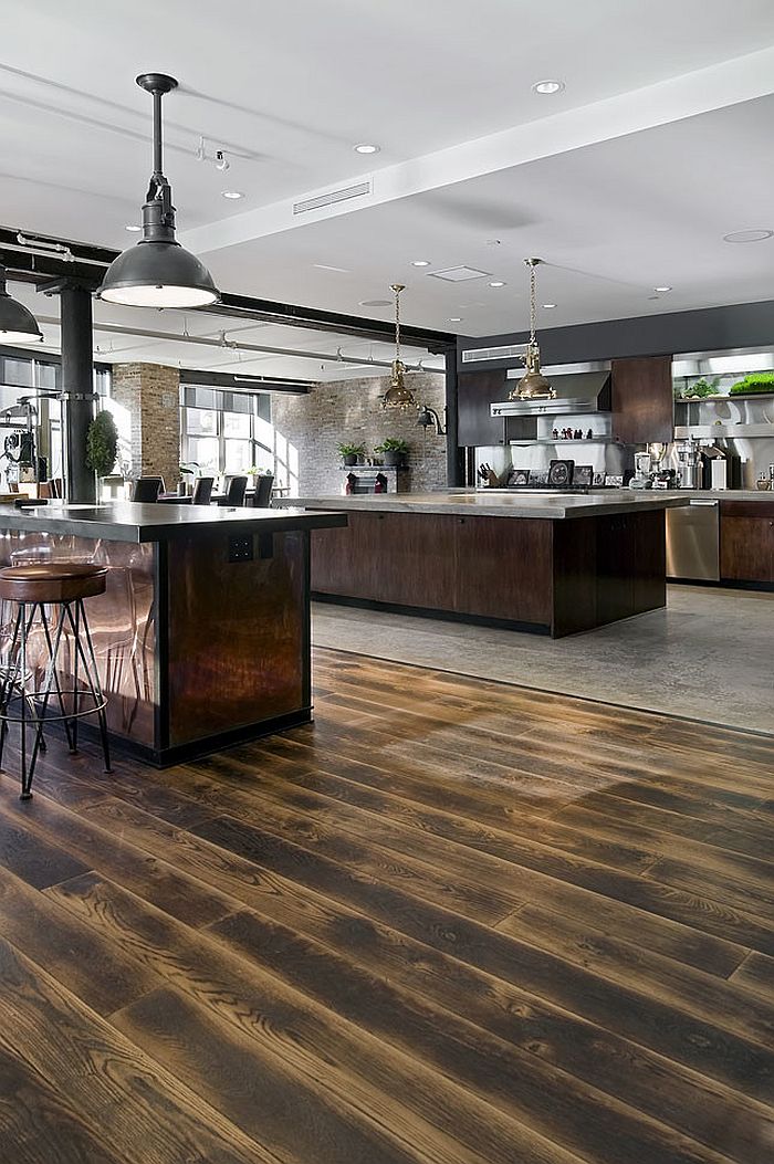 Expansive industrial kitchen in the loft home [Design: Siberian Floors]