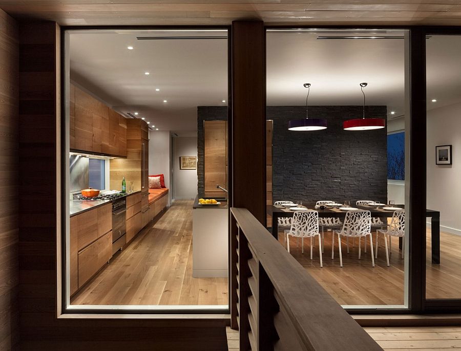 Formal dining room with a slate wall