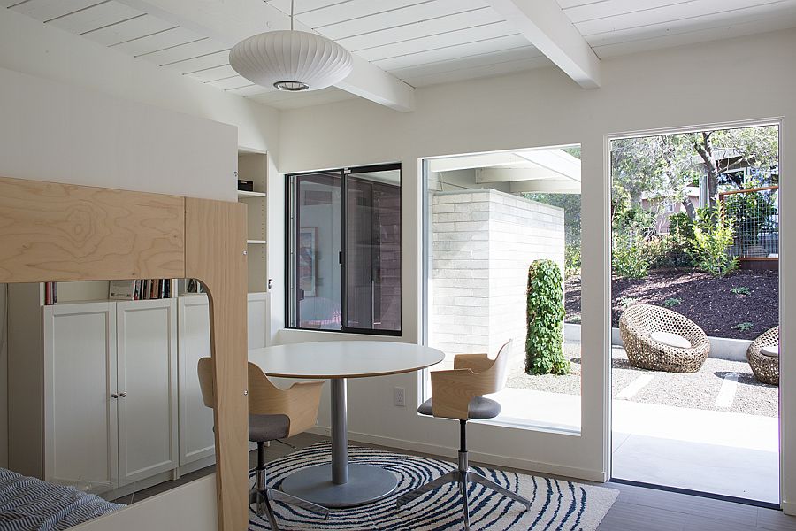 George Nelson lamp and sliding glass doors shape the interior