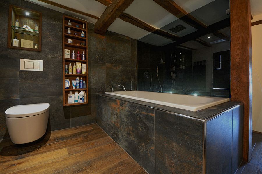 Gorgeous use of dark tones and intriguing textures in the rustic bathroom [Design: MillChris Developments]