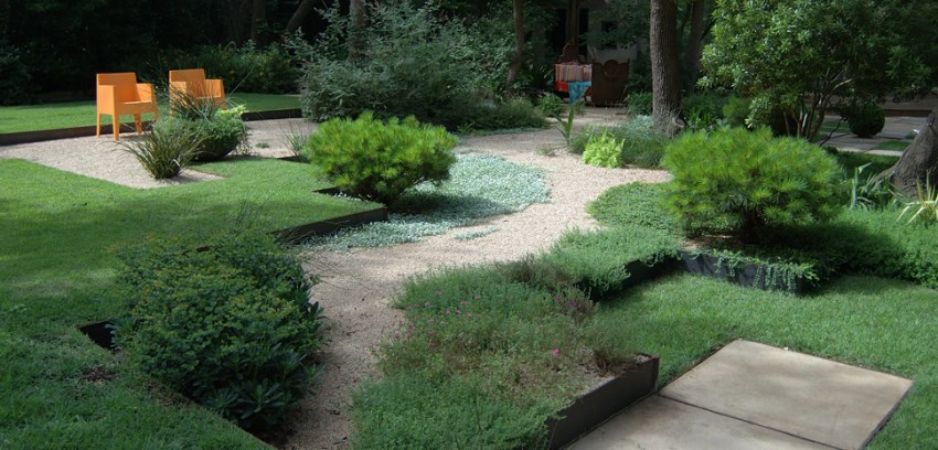 Grass and gravel in a landscaped outdoor space